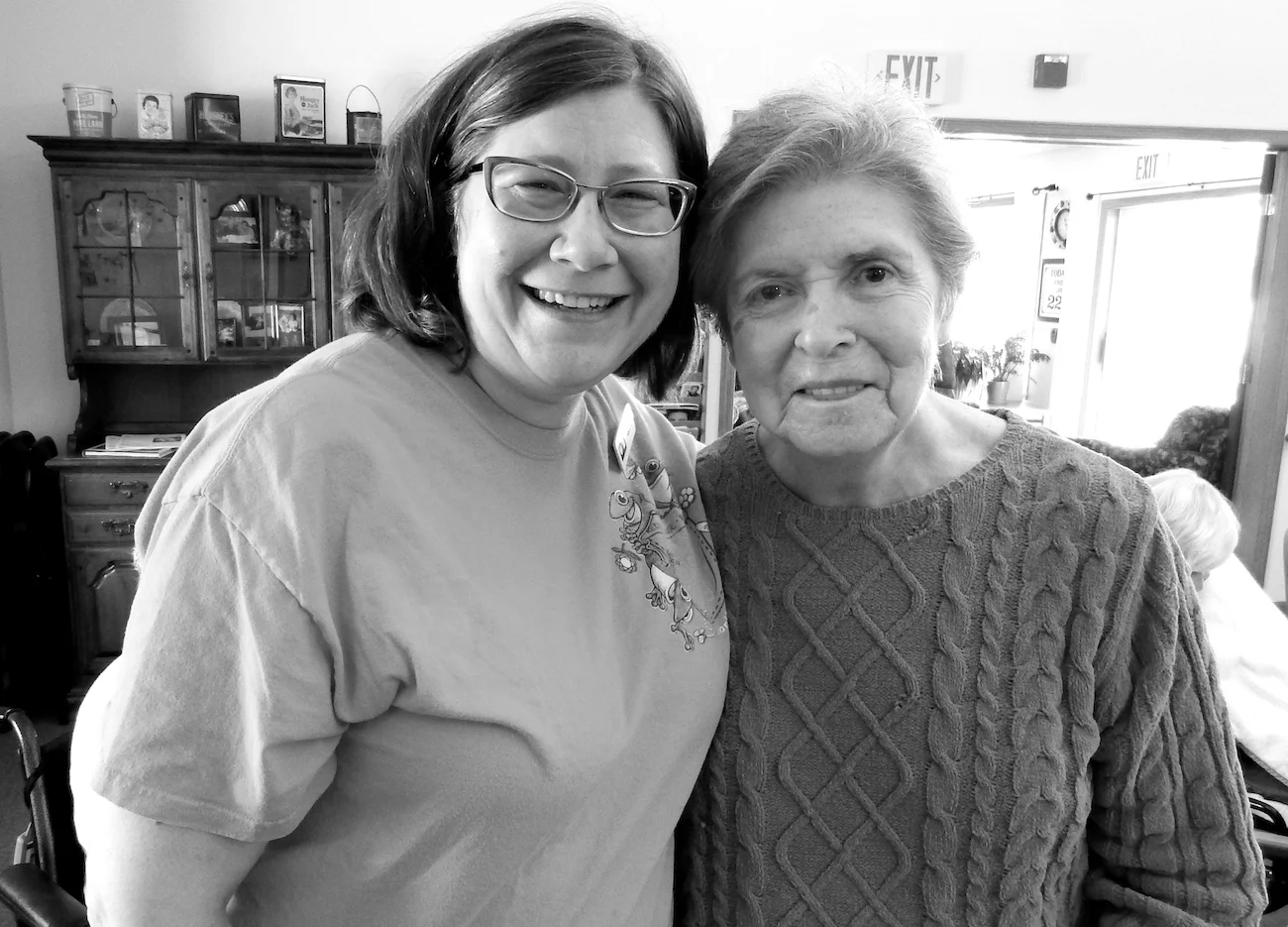 Caregiver and resident sharing a moment